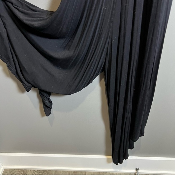 Loose Fit Black Romper Jumpsuit w/ Spaghetti straps and asymmetrical hemline - Picture 2 of 9